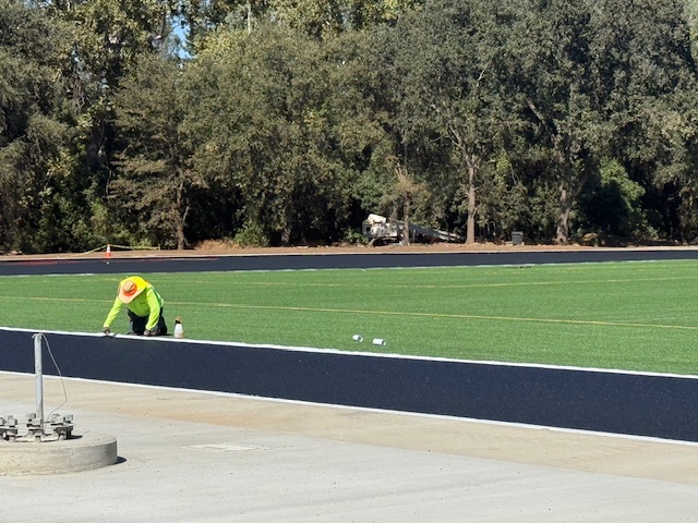A member of the construction crew puts on the final touches.