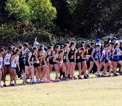 Cross country girls getting ready to race