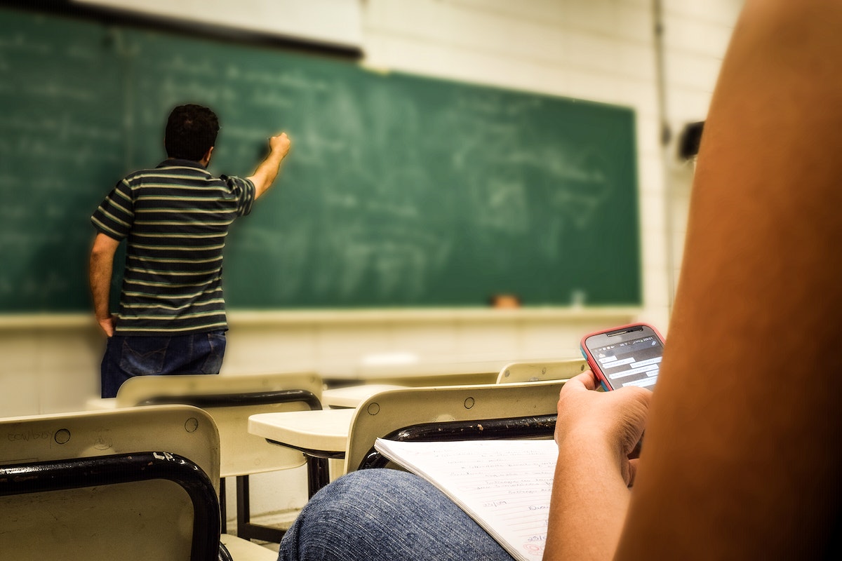 Students nowadays are very attached to their phones, even using it during class.