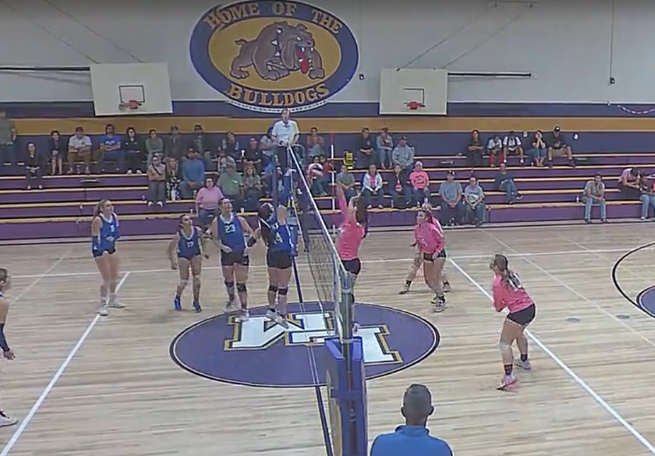Allison Freimuth, #14, love-taps the ball to the Bulldog's kennel