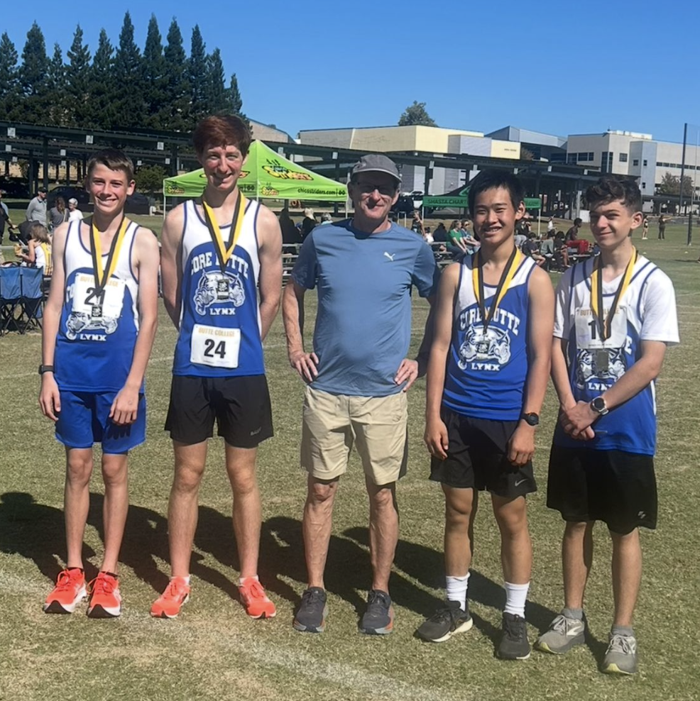 CORE boys who made it to top 10, and their coach, Mr. Freer.