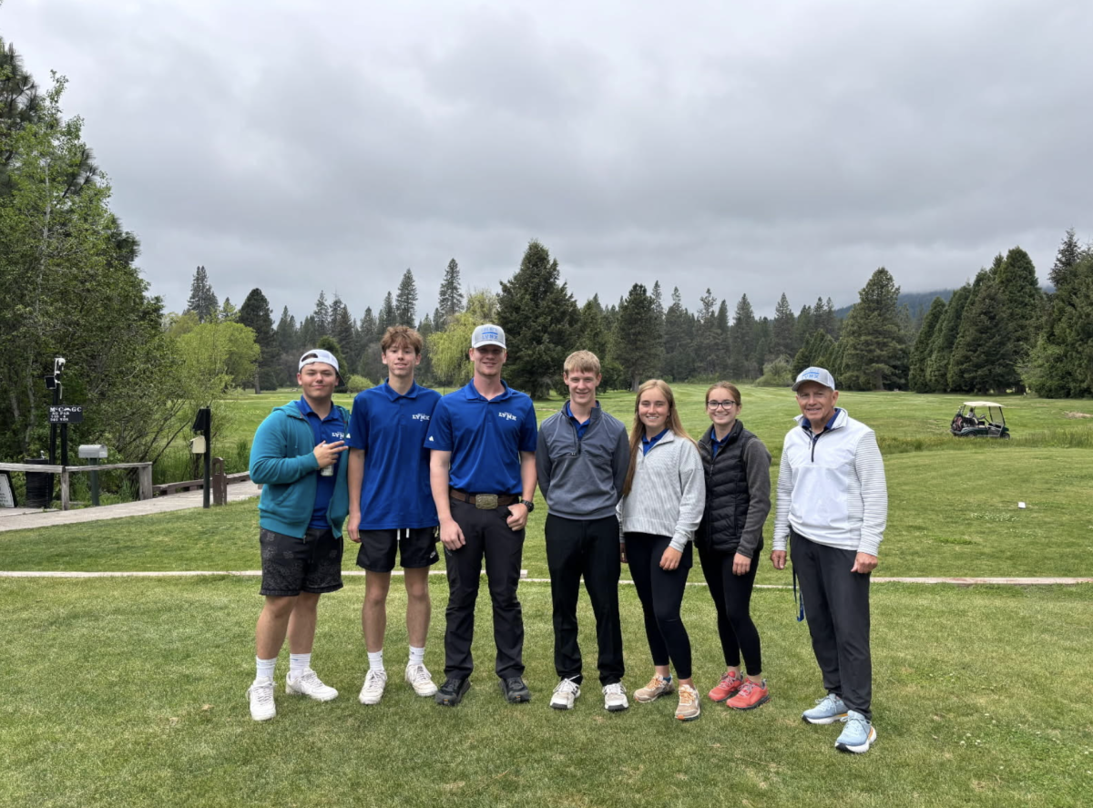 Mr. Koons (right) and his golf team (left).